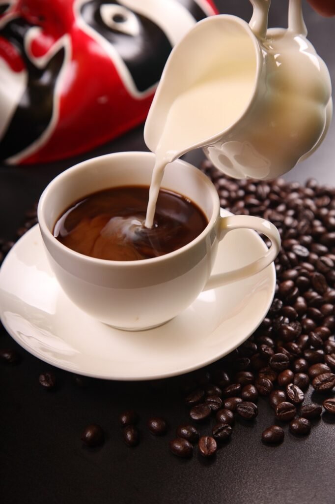 coffee, milk, coffee beans, cup of coffee, coffee cup, cup, pouring, cream, caffeine, cafe, pour, latte, drink, beverage, coffee, coffee, coffee, coffee, coffee-563800.jpg