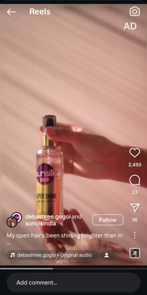 Debashree flips her open hair to reveal a glossy, frizz-free finish using Sunsilk serum.