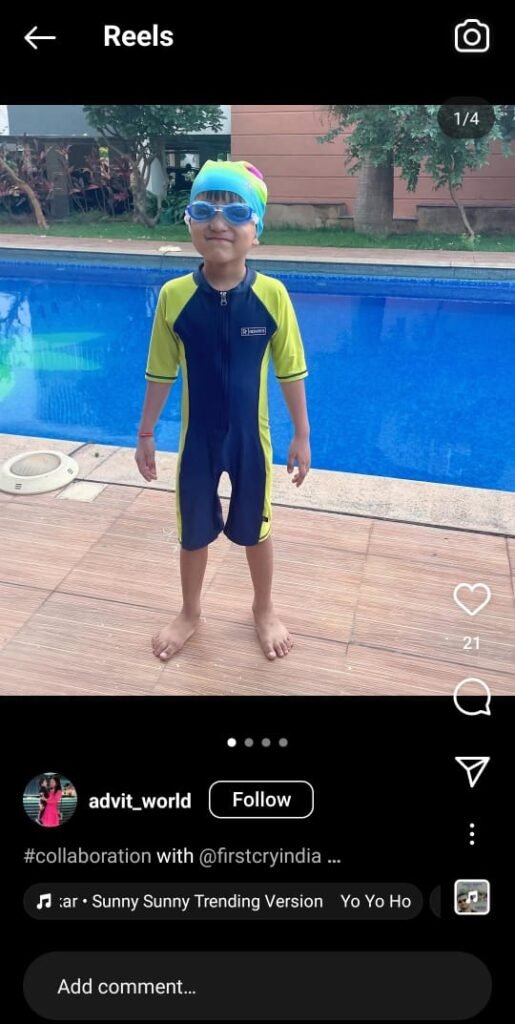 Toddler in vibrant swimwear ready for summer.